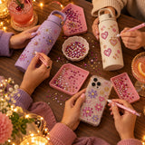 Girls' night bedazzling bottles and phone cases