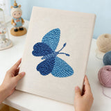 Blue butterfly punch needle kit finished artwork