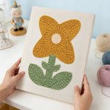 Yellow four-petal flower punch needle kit finished artwork